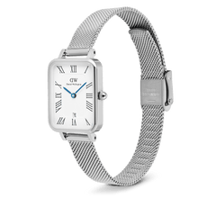 Daniel Wellington Quadro Sterling women's watch with a rectangular white dial, Roman numerals, date window, and a silver mesh strap.