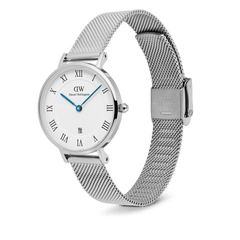 Daniel Wellington Petite Roman Numerals Date Silver women's watch featuring a white dial with Roman numerals, blue hands, a date window, and a silver mesh strap.