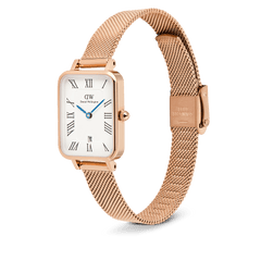Daniel Wellington Quadro Melrose womenâ€™s watch with a white rectangular dial, Roman numerals, date display, and rose gold mesh strap.