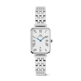 Daniel Wellington Quadro Roman Numerals Date watch in silver, featuring a rectangular white dial with Roman numerals, blue hands, a date window, and a 5-link bracelet.