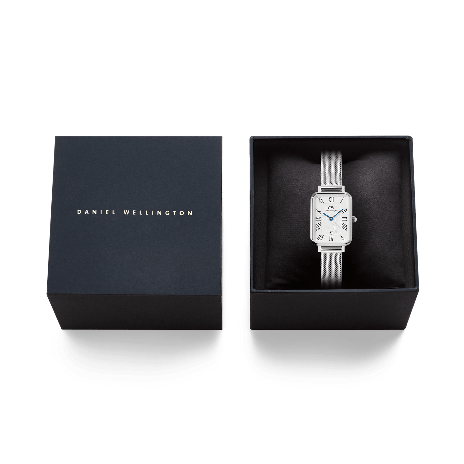 Daniel Wellington Quadro Sterling Roman Numerals Date watch in its presentation box, showing the rectangular white dial and silver mesh strap.
