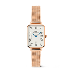 Daniel Wellington Quadro Melrose women's watch with a rectangular white dial, Roman numerals, a date window, and a rose gold mesh strap.
