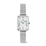Daniel Wellington Quadro Sterling women's watch with a rectangular silver case and mesh strap, featuring a white guillochÃ© dial with black Roman numerals, blue hands, and a date window.