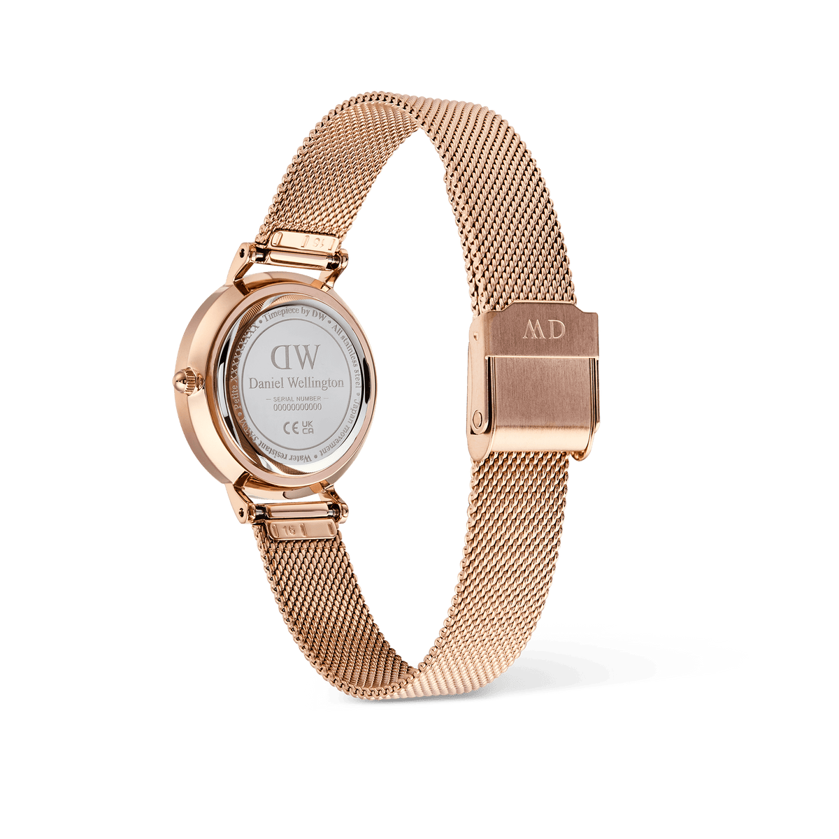 Back view of Petite Roman Numerals Date Rose Gold womenâ€™s watch showing engraved case and rose gold mesh strap by Daniel Wellington.